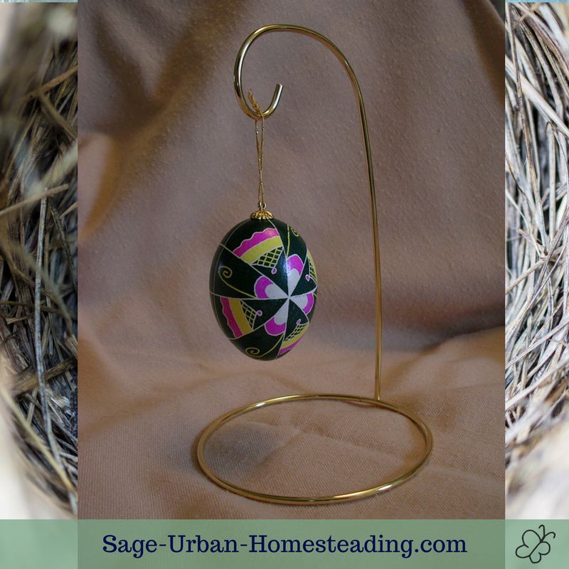 egg ornament hanging on display stand