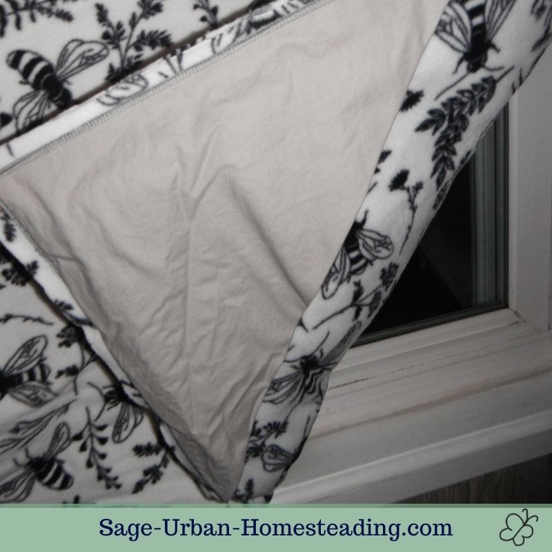 how to hang a window quilt with pockets
